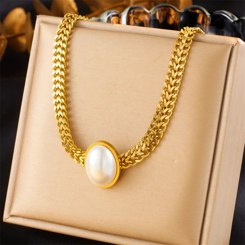 Anti-Tarnish Waterproof Pearl Bracelet - Gold Chain with Oval Pearl Centerpiece displayed on a gift box.