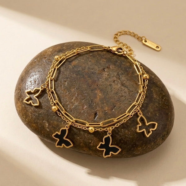 Whimsical Butterfly Layered Charm Bracelet – 18k Gold & Black Enamel