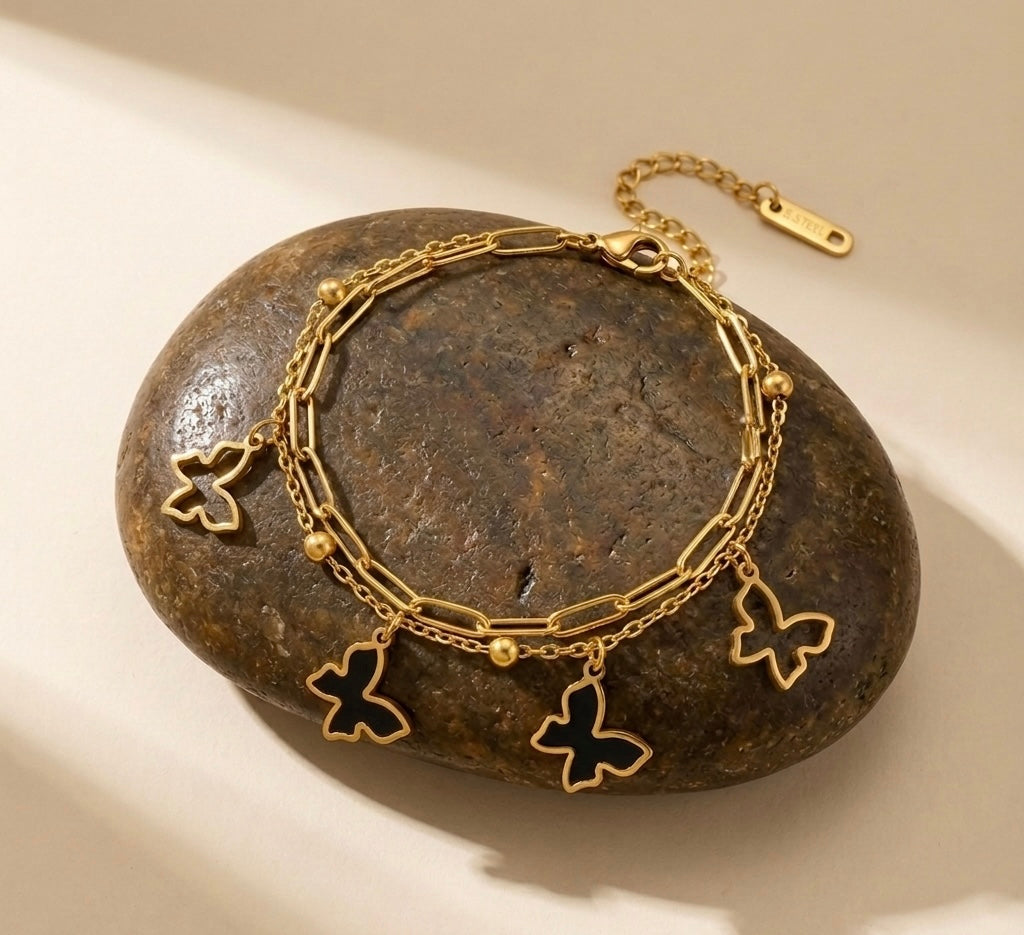 Whimsical Butterfly Layered Charm Bracelet – 18k Gold & Black Enamel