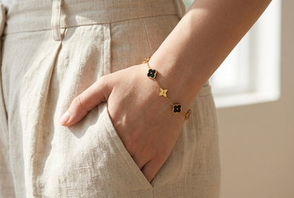 Luxurious Onyx Clover Motif Bracelet – 18k Gold & Black Enamel