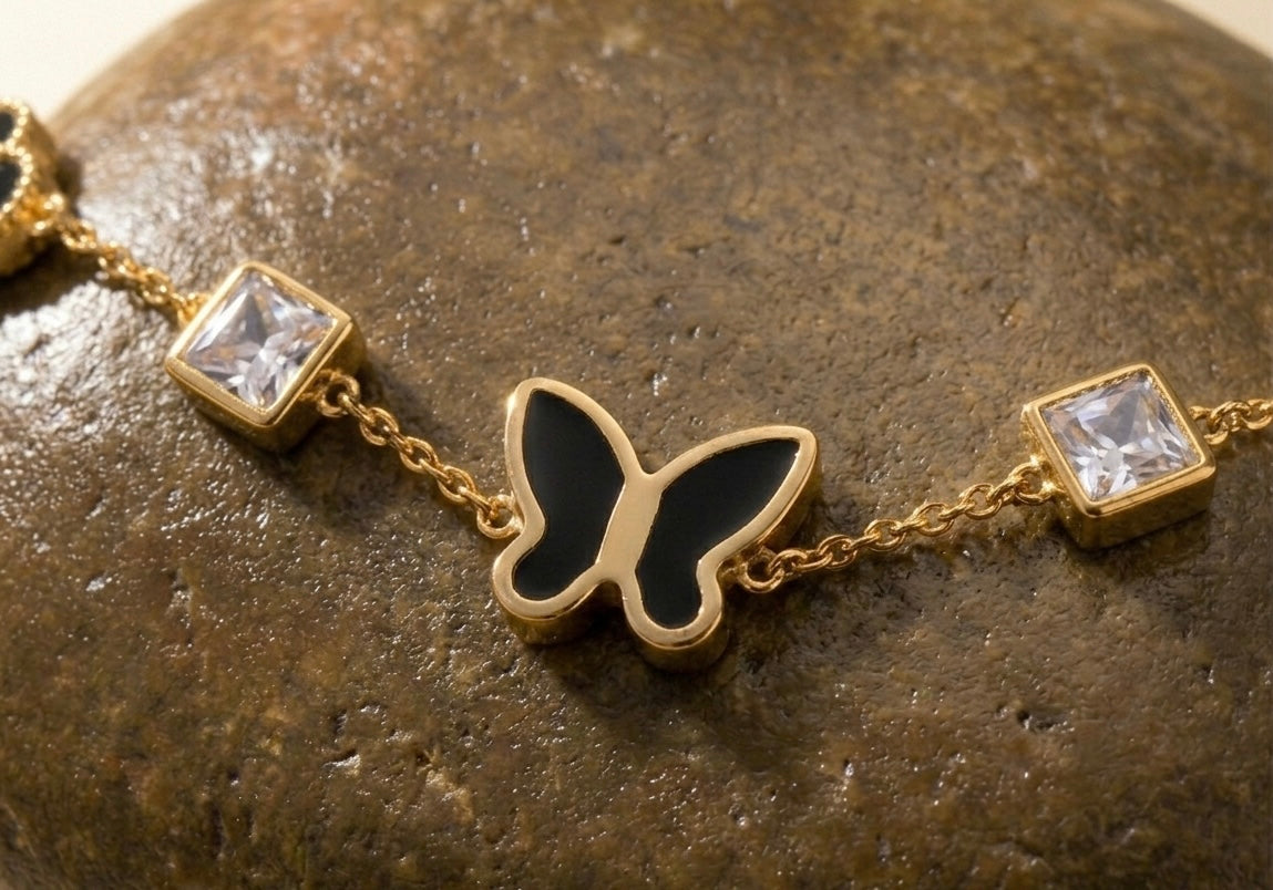 Gold Butterfly Charm Bracelet with Black Clovers | Waterproof & Tarnish-Free
