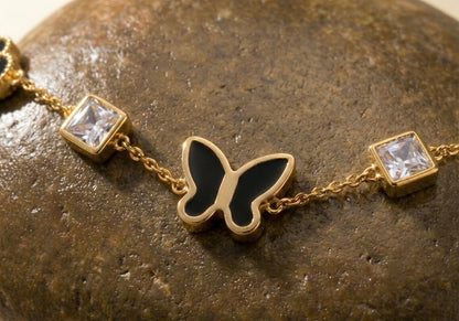 Gold Butterfly Charm Bracelet with Black Clovers | Waterproof & Tarnish-Free