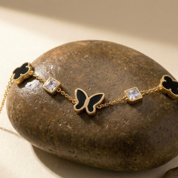 Gold Butterfly Charm Bracelet with Black Clovers | Waterproof & Tarnish-Free