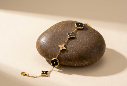 Luxurious Onyx Clover Motif Bracelet – 18k Gold & Black Enamel