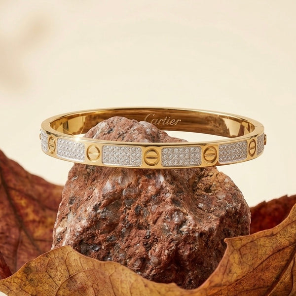 Luxury Crystal-Pave Gold Bangle – Icy Studded Statement Bracelet with Screw Motif