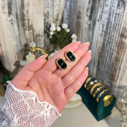 18K Gold Plated Roman Numeral Clock Earrings | Vintage Oval Studs with Black Enamel Face - ACERO JEWELS