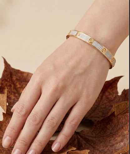 Luxury Crystal-Pave Gold Bangle – Icy Studded Statement Bracelet with Screw Motif