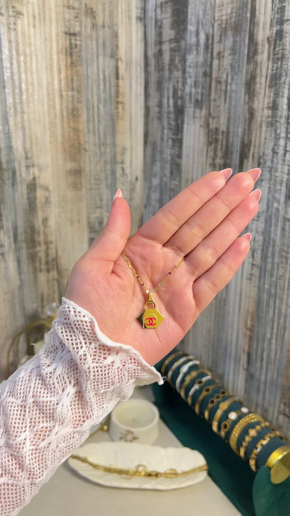 Luxury Handbag Pendant Necklace | Gold Plated Designer-Inspired Tote Charm with Pink Logo | Trendy Fashion Jewelry for Women & Girls